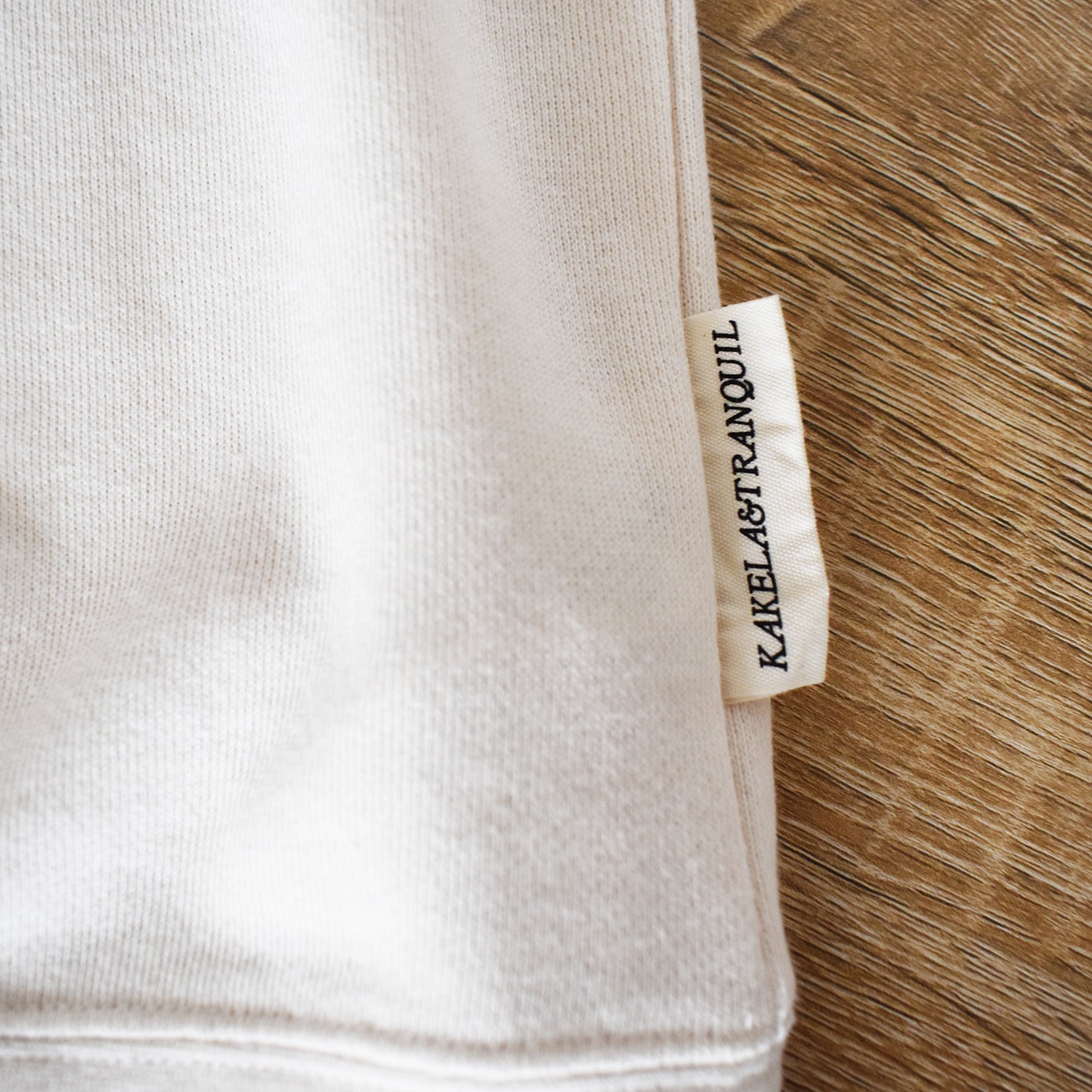 【KAKELA&TRANQUIL】ロングクルーカレッジ刺繍
