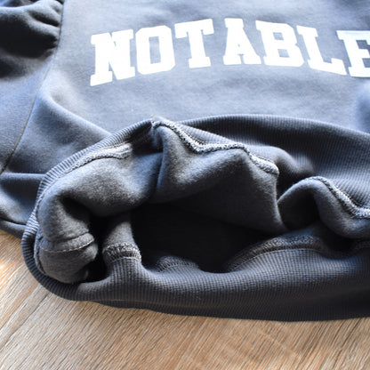 【gleam】裏起毛ロゴプリントパフ袖プルオーバー