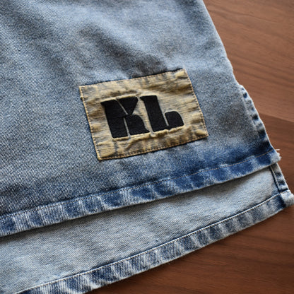 【KAKELA＆TRANQUIL】ノーカラーフリルデニムシャツ